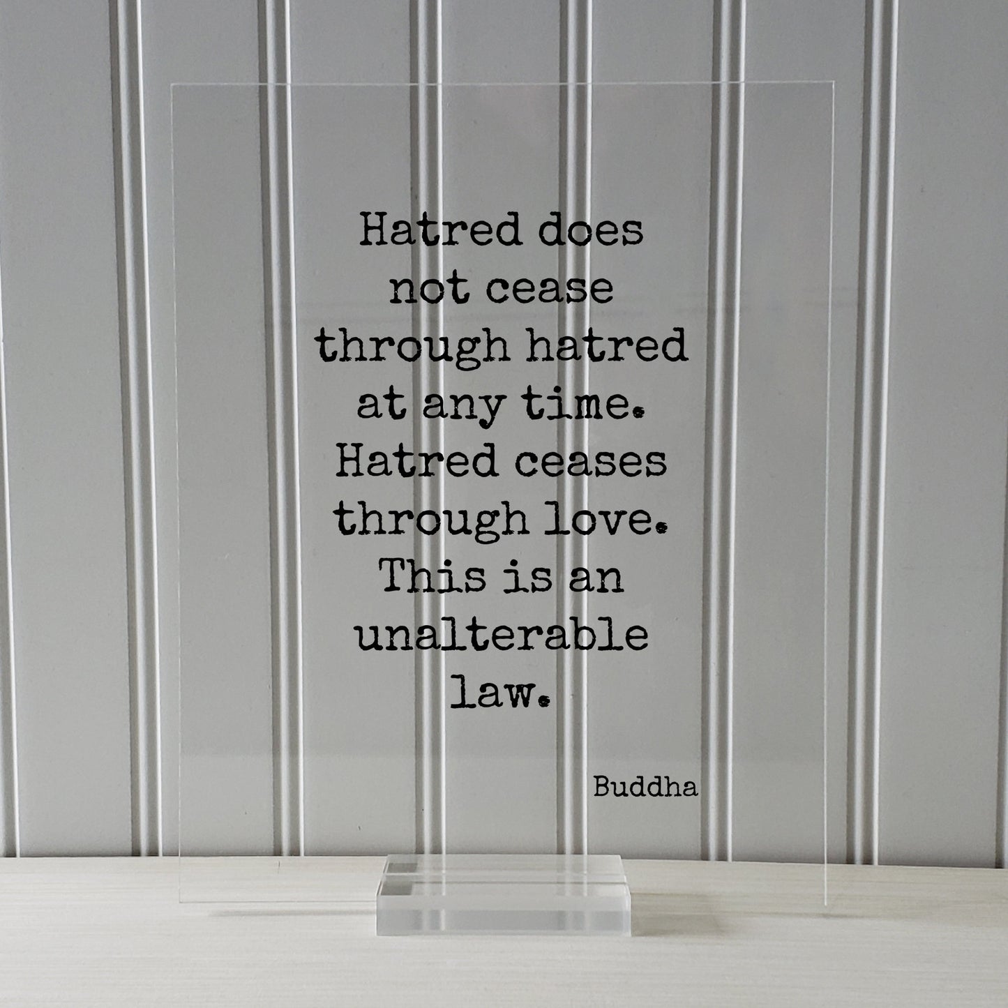 Buddha - Hatred does not cease through hatred at any time. Hatred ceases through love. This is an unalterable law - Floating Quote Buddhism