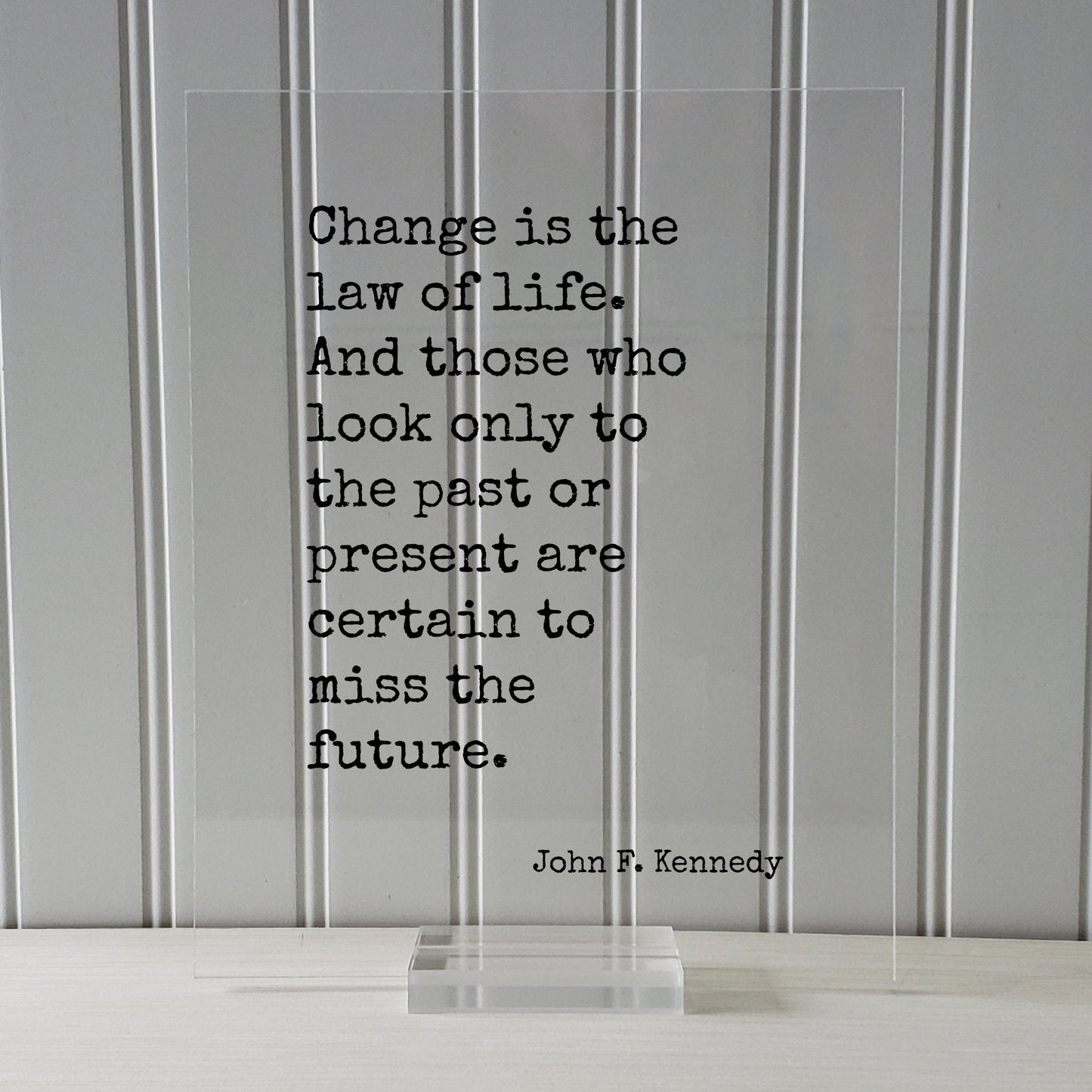 John F. Kennedy - Floating Quote - Change is the law of life. And those who look only to the past or present are certain to miss the future