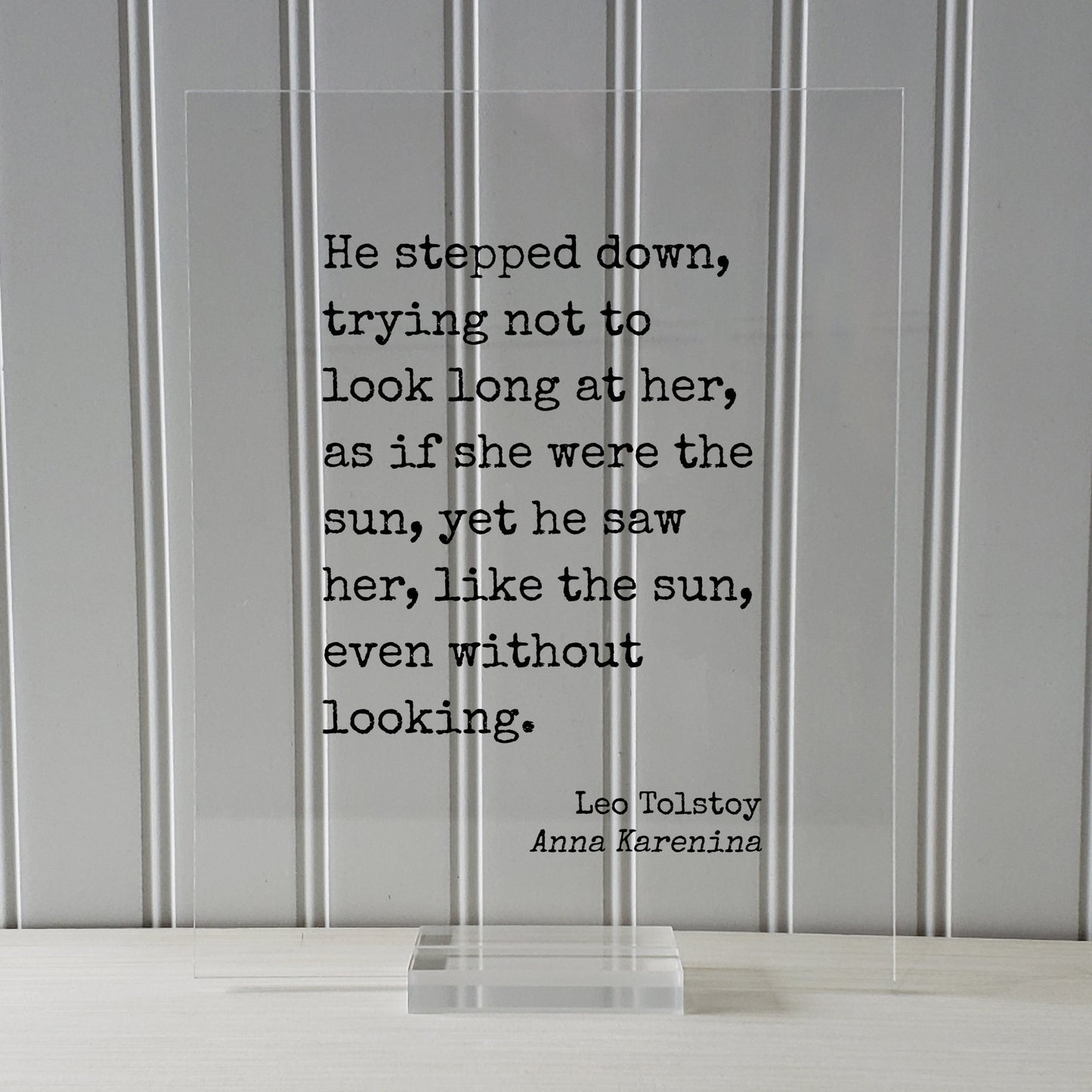 Leo Tolstoy - Anna Karenina - He stepped down trying not to look long at her as if she were the sun he saw her like the sun without looking.