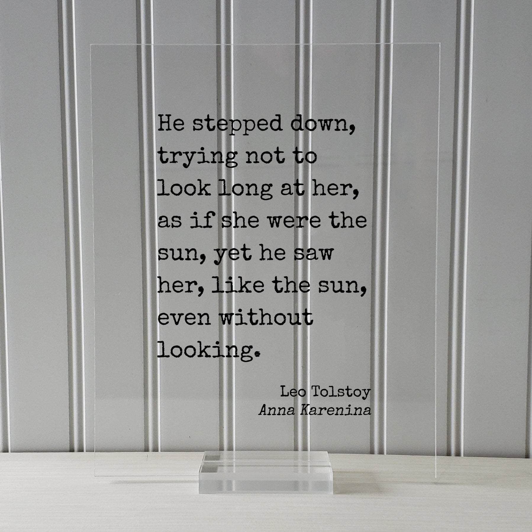Leo Tolstoy - Anna Karenina - He stepped down trying not to look long at her as if she were the sun he saw her like the sun without looking.