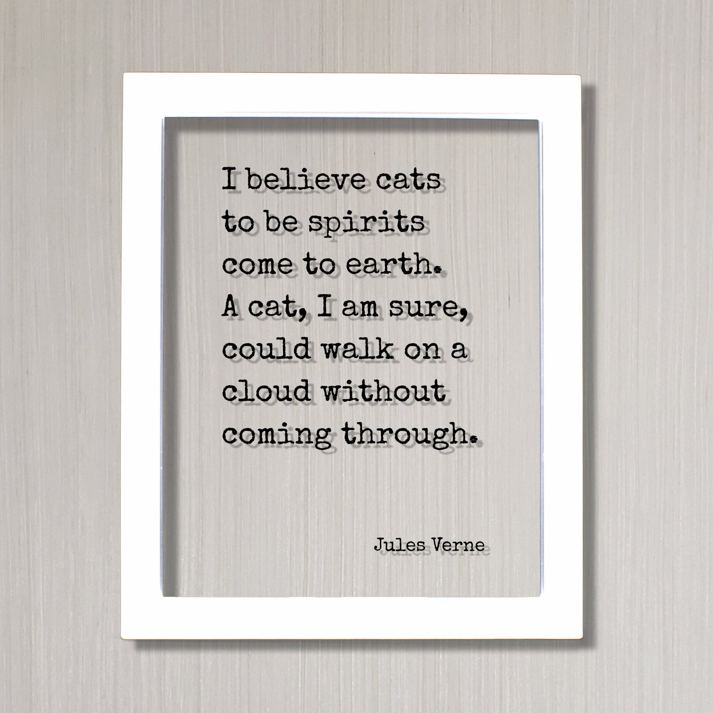 Cat Quote - Jules Verne - I believe cats to be spirits come to earth. A cat, I am sure, could walk on a cloud without coming through