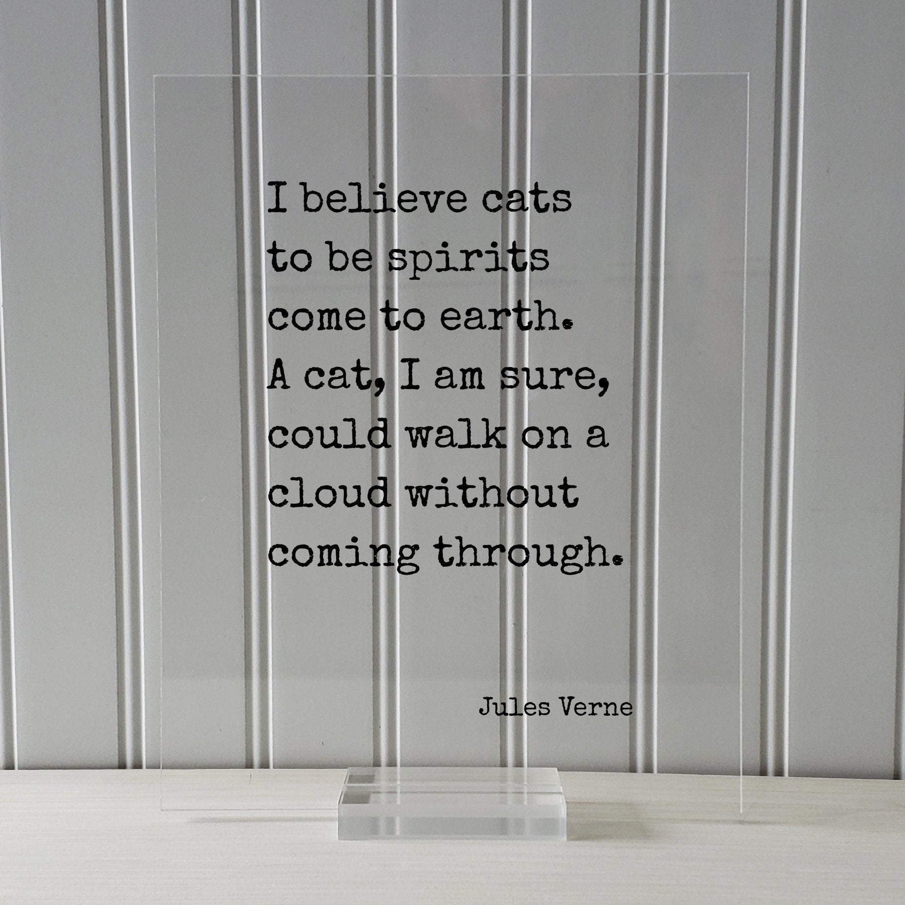 Cat Quote - Jules Verne - I believe cats to be spirits come to earth. A cat, I am sure, could walk on a cloud without coming through
