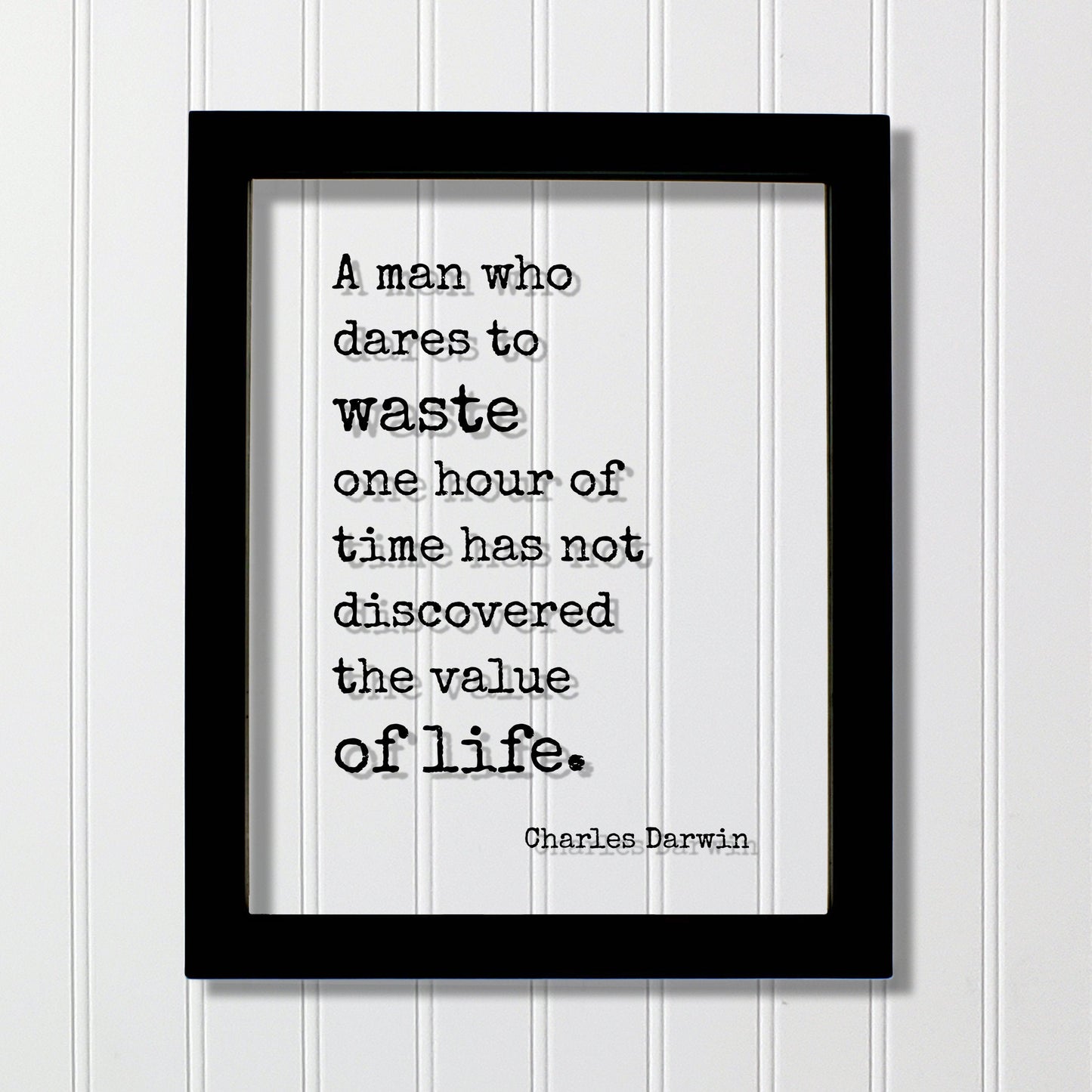 Charles Darwin - Floating Quote - A man who dares to waste one hour of time has not discovered the value of life - Time Management