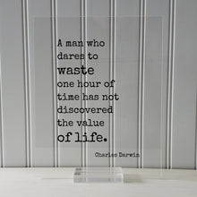 Charles Darwin - Floating Quote - A man who dares to waste one hour of time has not discovered the value of life - Time Management