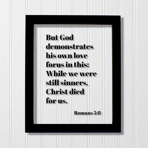 Romans 5:8 - But God demonstrates his own love for us in this While we were still sinners Christ died for us - Scripture Frame - Bible Verse
